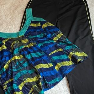 22/24 REEBOK PLAY PLUS TANK SIDE RUCHING B…